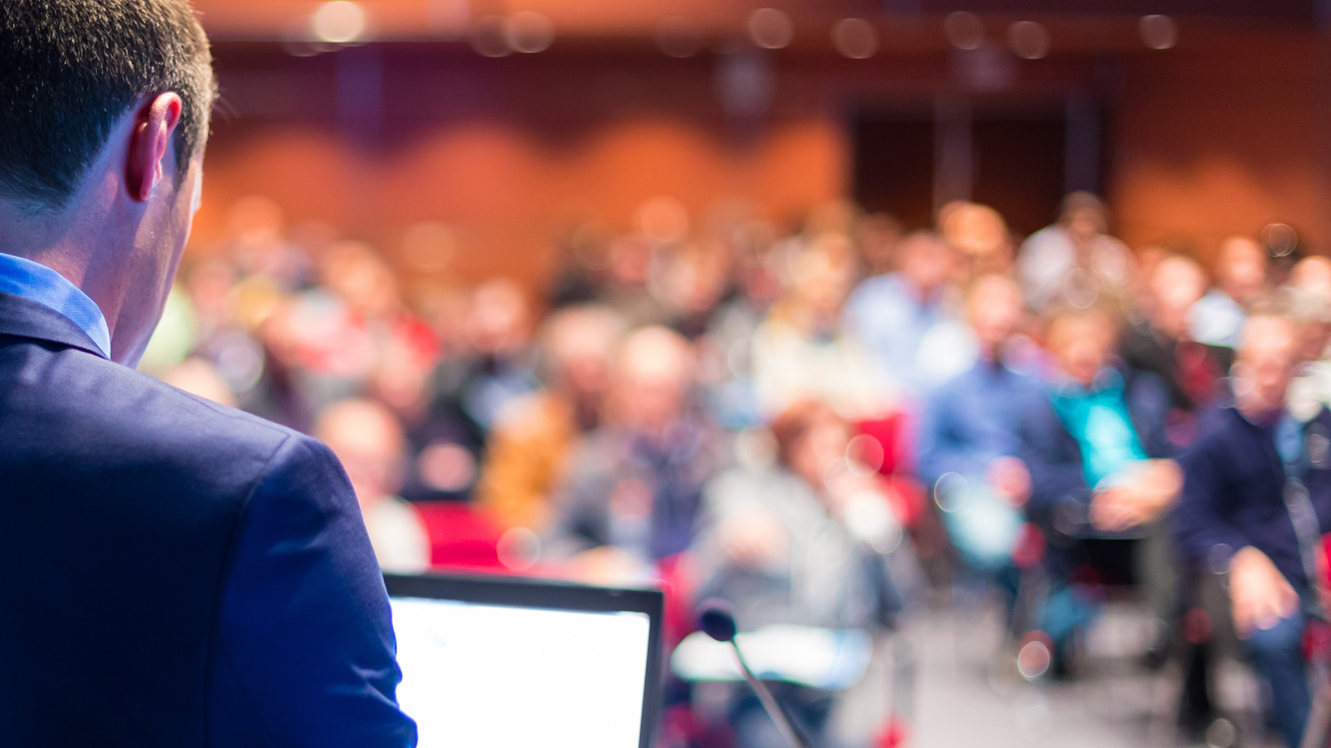 HR Forum Tile Image - Human Resources Page two men in building yard with hard hats, shaking hands
