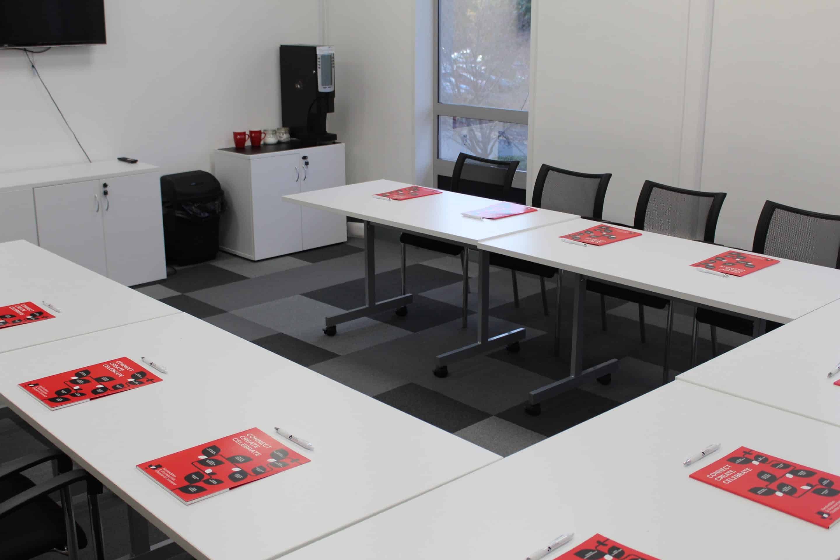 men in hi visibility jackets packing boxes